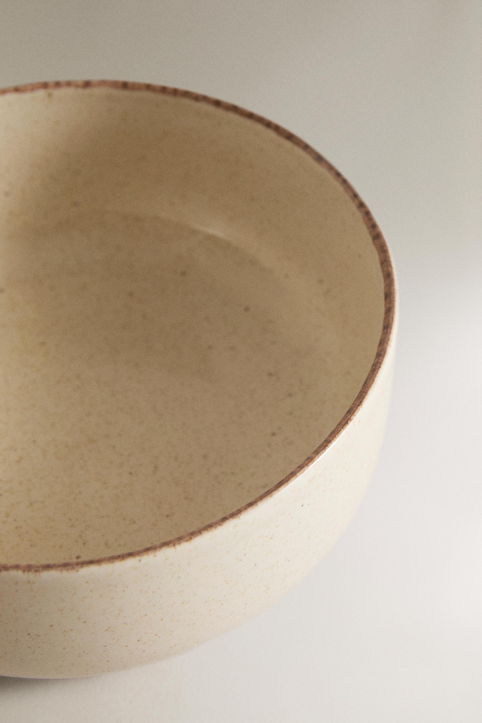 STONEWARE BOWL WITH AGED RIM